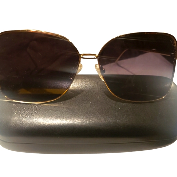 Dark Blue Lenses with gold frames. - Picture 2 of 3